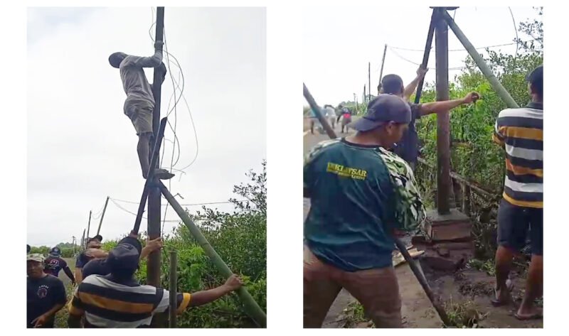 Gotong Royong : Warga bersama-sama kerja bakti memasang tiang lampu untuk penerangan jalan menuju makam sepanjang 450 meter hasil swadaya bersama (Foto : Warga Dusun Simbar 1/Jatim.co) 