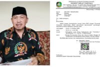 Sampaikan Tanggapan - Ketua Persatuan Anggota BPD Seluruh Indonesia (PABPDSI) Kabupaten Banyuwangi, Misnadi memberikan tanggapan resmi melalui video pernyataan tentang surat undangan dari sekretaris daerah dalam acara yang dilaksanakan oleh Asosiasi BPD Banyuwangi (Foto : Jatim.co)
